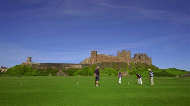 Croquet Being Played Infront Of Bamburgh Castle, Northumberland, England