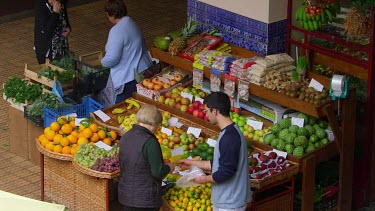 Customers At Fruit & Vegetable Stall, Funchal Market, Madeira, Portugal