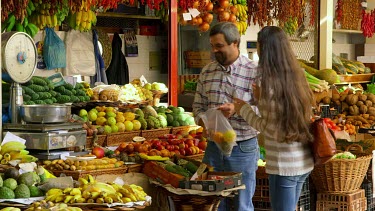 Customer Buys Exotic Fruits, Funchal Market, Madeira, Portugal