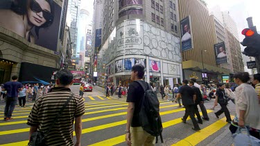 Pedestrians Crossing Queens Road At D'Aguilar Street, Central, Hong Kong, Asia