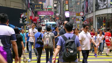 Pedestrians Crossing Queens Road At D'Aguilar Street, Central, Hong Kong, Asia