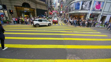 Pedestrians Crossing Queens Road At D'Aguilar Street, Central, Hong Kong, Asia