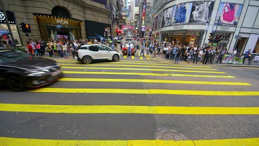 Pedestrians Crossing Queens Road At D'Aguilar Street, Central, Hong Kong, Asia