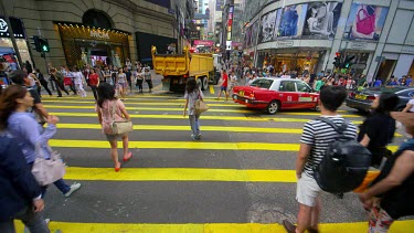 Pedestrians Crossing Queens Road At D'Aguilar Street, Central, Hong Kong, Asia