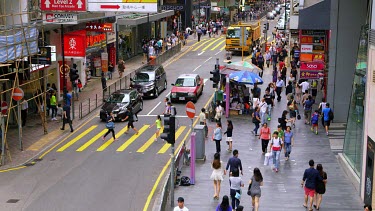 Traffic & Pedestrians On Queens Road, Central, Hong Kong, Asia