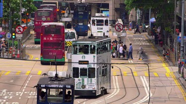 Trams, Buses & Pedestrians On Des Voeux Road, Central, Hong Kong
