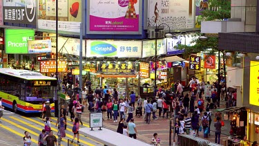 Taxis, Buses & Pedestrians On Yee Wo Street, Causeway Bay, Hong Kong, China