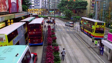Buses, Taxi'S & Pedestrians On Yee Wo Street, Causeway Bay, Hong Kong, China