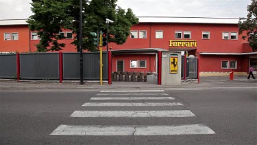 Black Ferrari F12 Berlinetta & Old Factory Gate Entrance, Maranello, Italy