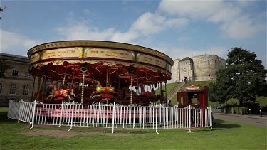Cliffords Tower & Fairground Carousel, York, North Yorkshire, England