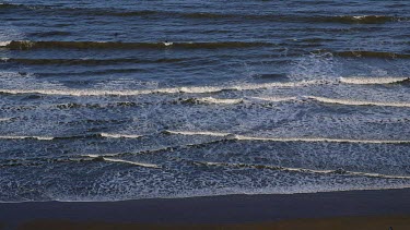 North Sea Waves & Surfers, North Bay, Scarborough, North Yorkshire, England