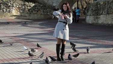 Woman Hand Feeds Pigeons, Sevastopol, Crimea, Ukraine