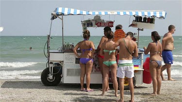 People Queue At Drinks Buggy, Lido, Venice, Italy