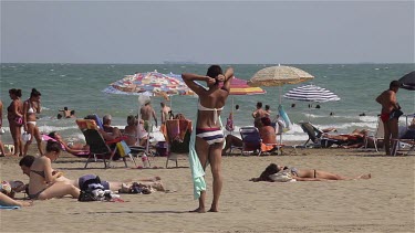 Tourists & Parasols On Beach, Lido, Venice, Italy