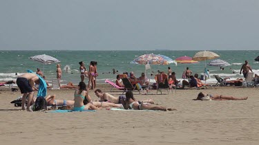Sunbathers On Beach, Lido, Venice, Italy