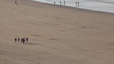 People Walking On Beach, Saltburn-By-The-Sea, North Yorkshire, England