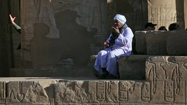 Arab Sat On Large Building Stone, Kom Ombo, Egypt, North Africa
