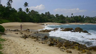 Woman Walks Along Indian Ocean Beach, Tangalle, Sri Lanka