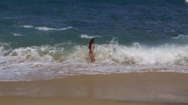 Woman Hit By Surf On Indian Ocean Beach, Tangalle, Sri Lanka