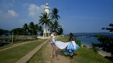 Woman Sells Lace Products At Lighthouse, Galle Forte, Sri Lanka