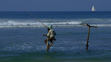 Lone Stilt Fisherman & Yacht, Weligama, Sri Lanka, Asia