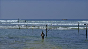 Lone Stilt Fisherman Leaving, Weligama, Sri Lanka, Asia