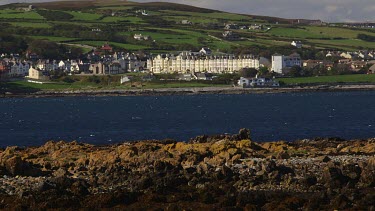 Rocks, Irish Sea & The Promenade Houses, Port Saint Mary, Isle Of Man, British Isles