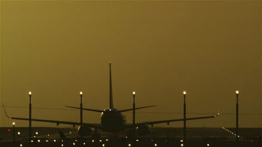 Thompsons Jet Airliner Takes Off At Sunset, Manchester, England