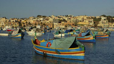 Multi-Coloured Fishing Boats & Town, Marsaxlokk, Malta