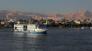 Cruise Liner Makes Turn, River Nile, Luxor, Egypt