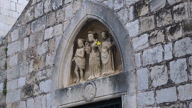 Statue Of St.Vlaho On City Wall With Daffodil, Old Town, Dubrovnik, Croatia