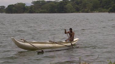 Canoe Fisherman Paddling, Kala Wewa Lake, Sri Lanka