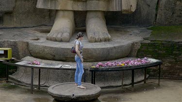 Aukana Buddha Statue Feet & Tourist, Near Kekirawa, Sri Lanka