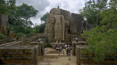 Aukana Buddha Statue & Tourists, Near Kekirawa, Sri Lanka
