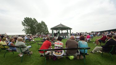 Showgoers Sat Around Bandstand, The Great Yorkshire Show, North Yorkshire